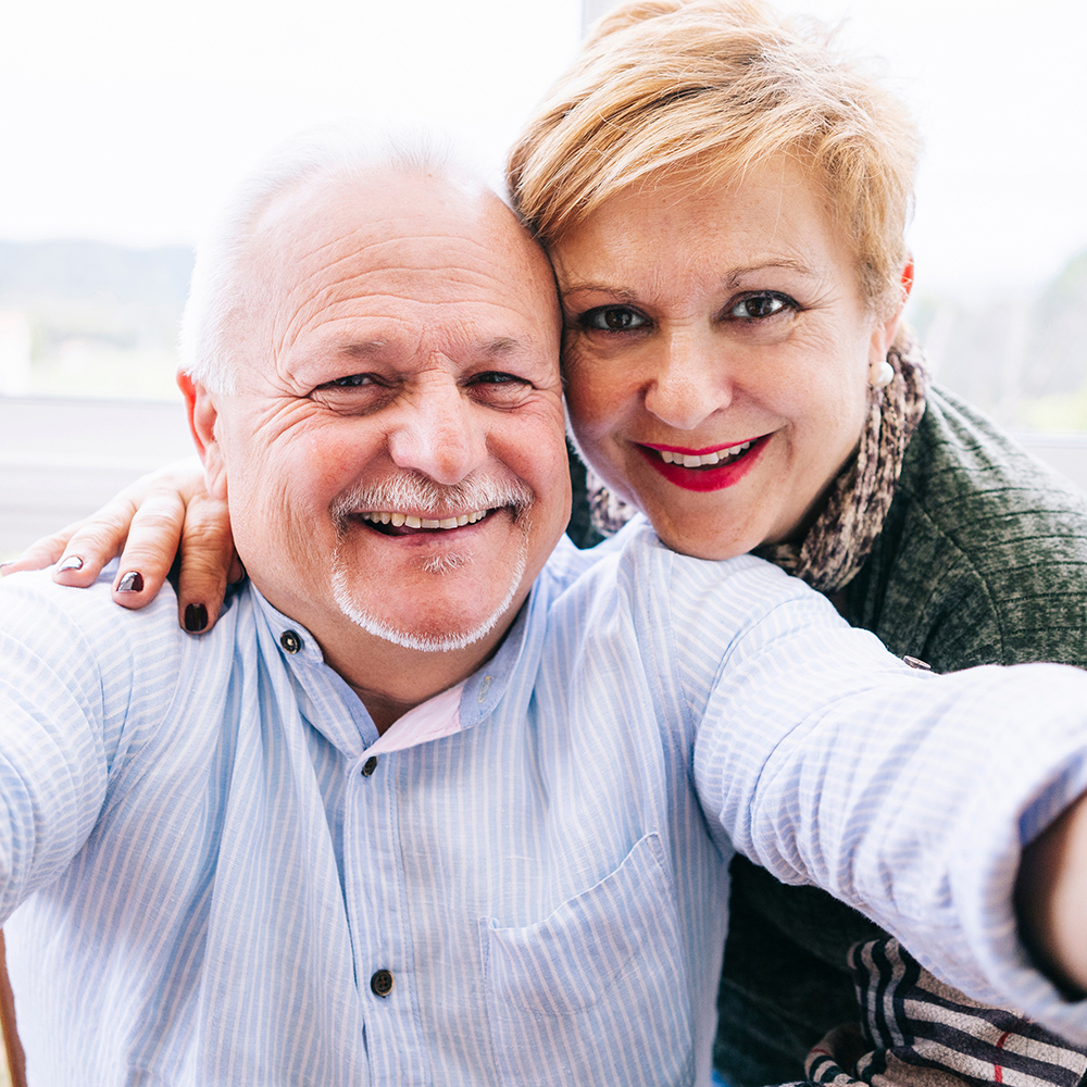 couple happy about their life insurance policy